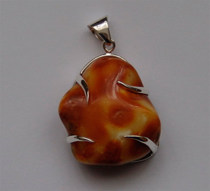 SILVER AND AMBER PENDANTS