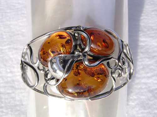 SILVER AND AMBER BRACELETS