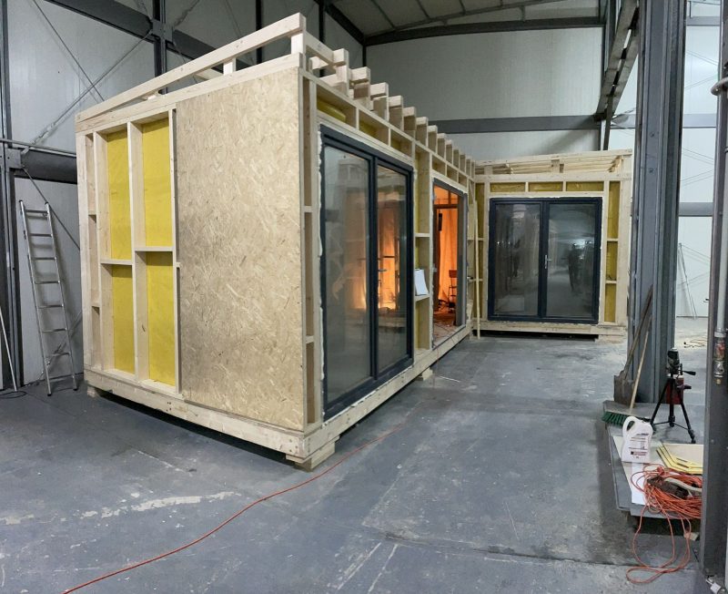 WOODEN HOUSES WITH FRAME CONSTRUCTION